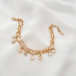 دستبند دولاین فیگارو و هرمس با آویز نگین تنیسی ژوپینگ