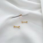پیرسینگ گوش تک نگین گلد استیل