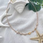 گردنبند مهره ای صورتی شفاف سنگی با پلاک قلب