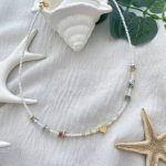 گردنبند مهره ای سفید سنگی با پلاک قلب