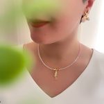 گردنبند مهره ای صورتی مات با آویز پری دریایی